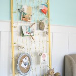Crib mattress turned bulletin board craft room storage LollyJane