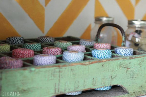 Vintage crate for the craft room, perfect size to hold bakers twine! #organization #craftroom