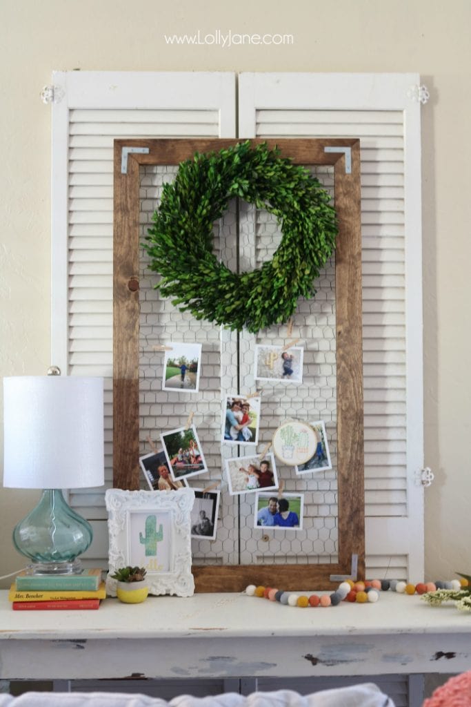 Love this easy to build rustic photo display. Such a cute way to share pictures! Cute chickenwire frame idea