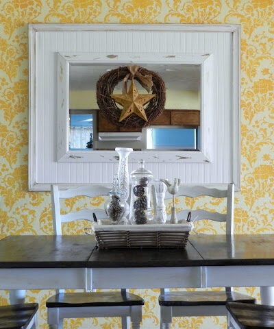 DIY bead board molding mirror. Make this mirror by layering it on top of a piece of wood, wallpapered with bead board wallpaper! Great way to fake a giant custom mirror!