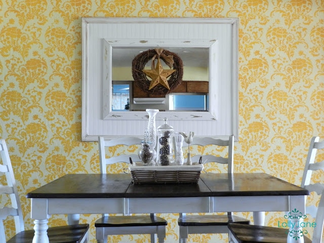 DIY bead board molding mirror. Make this mirror by layering it on top of a piece of wood, wallpapered with bead board wallpaper! Great way to fake a giant custom mirror!