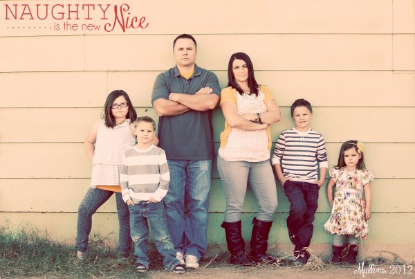 Naughty is the new nice family Christmas card idea. Get silly with family Christmas pictures for a fun Christmas card idea. #familyChristmaspicture #christmascardideas #familyposeideas #christmascardtheme