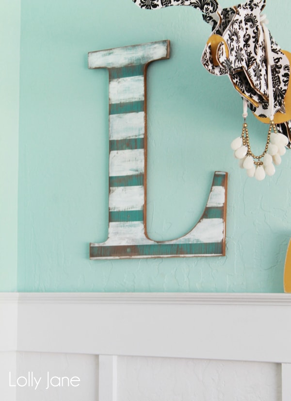 Distressed striped wall letter