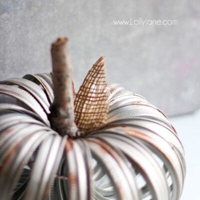 Faux aged canning ring pumpkin