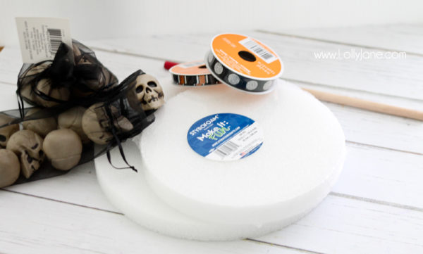 Supplies to make a cute Halloween skull cake stand 