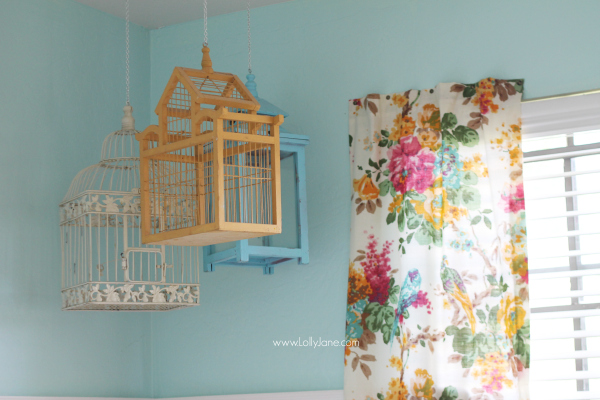 Hang some colorful bird cages in an eclectic craft room! @lollyjaneblog