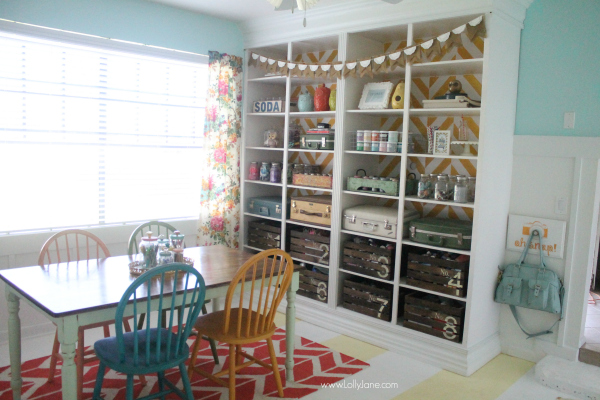 Lolly Jane's fun herringbone bookcase in their craft room! Love this space! @lollyjaneblog