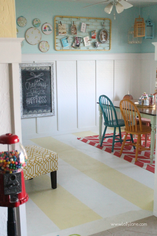 Such a fun craft room with striped painted floors! 