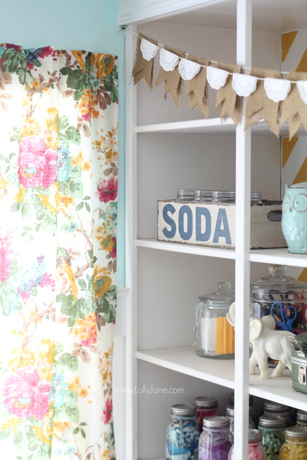 Quick tip to hang a faux curtain without a rod? Upholstery tacks!! Looks great in this craft room! @lollyjaneblog