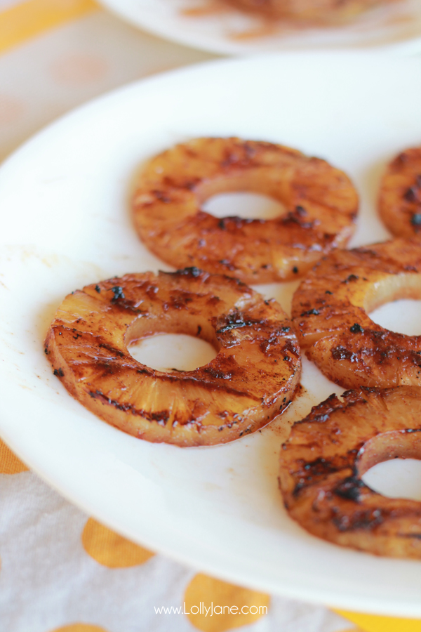 Grilled Pineapple with a Cinnamon Sugar Glaze. The perfect side dish for any BBQ- top with ice cream for a real treat! via lollyjane.com 