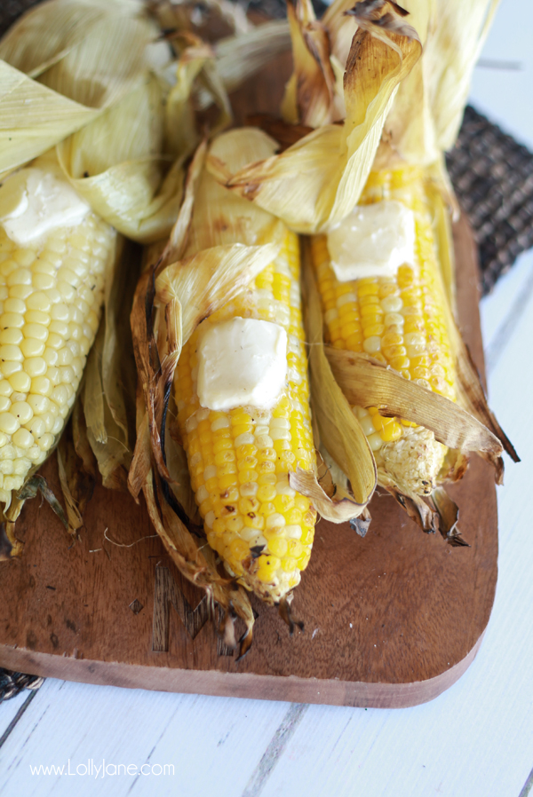 Perfectly grilled corn on the cob. Learn how to grill it with the husks on! via lollyjane.com