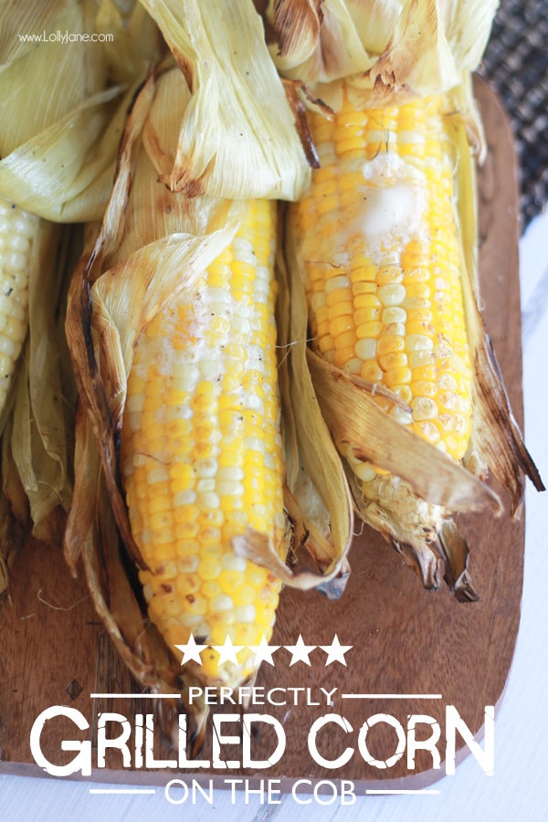 Perfectly grilled corn on the cob. Learn how to grill it with the husks on! via lollyjane.com