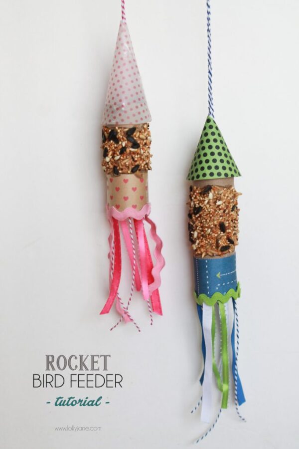 DIY rocket bird feeder... made from scrapbook paper and a toilet paper roll! Great kids craft!