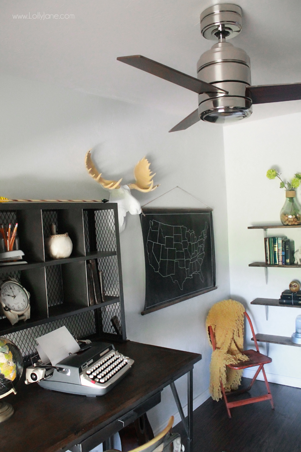Industrial man cave home office. Love the modern ceiling fan and that desk! Awesome space! 