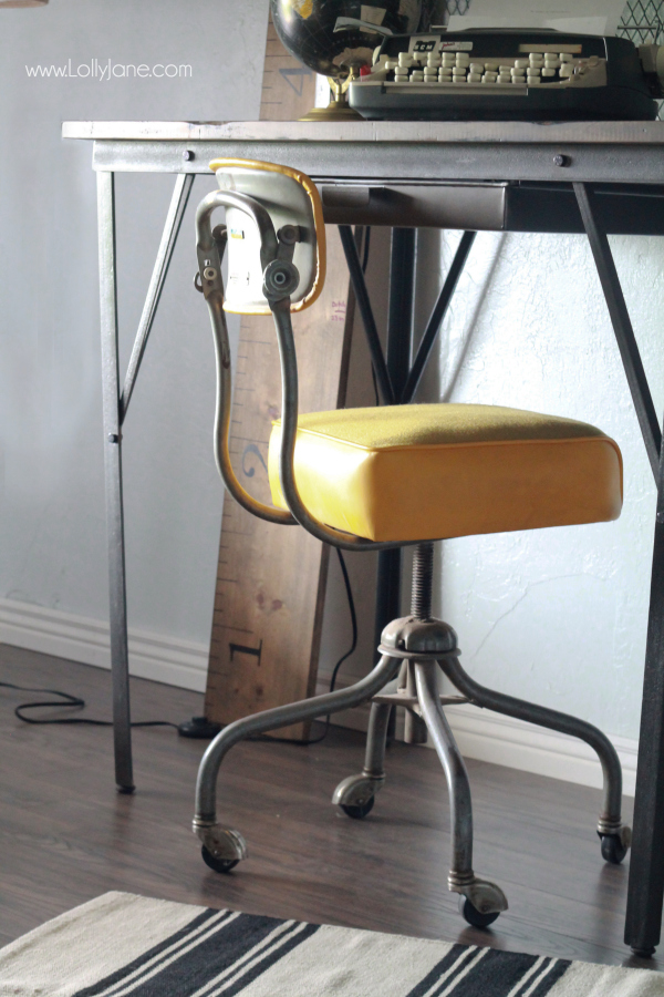 Industrial man cave home office. Love the modern ceiling fan and that desk! Awesome space! 