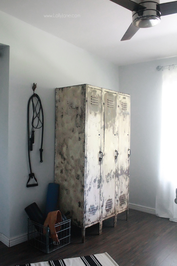 Awesome industrial man cave/home office space! These vintage lockers are awesome for work out equipment and make a great storage solution!