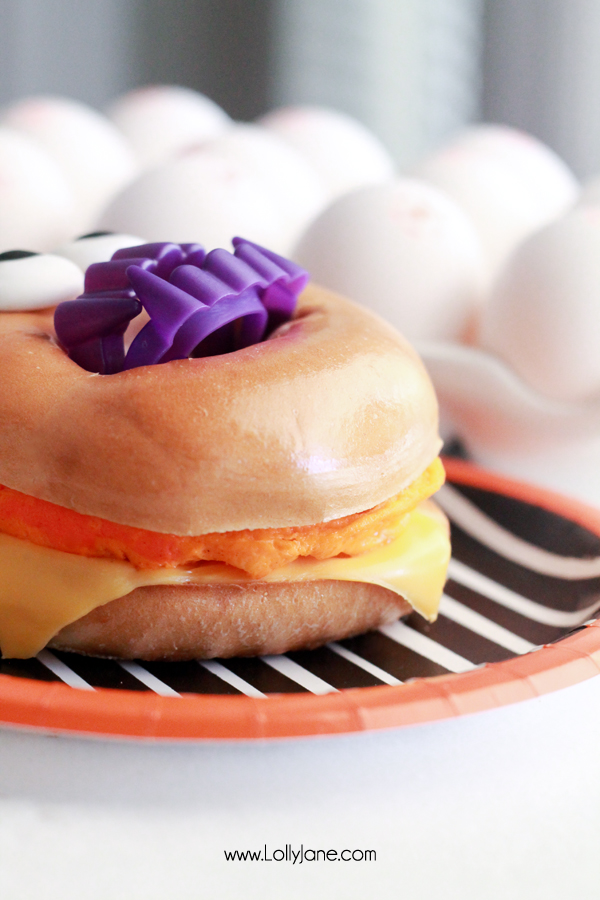 Monster Breakfast Bagel! Eggs inside are dyed bright colors + decorated like monsters- fun for a Halloween breakfast!