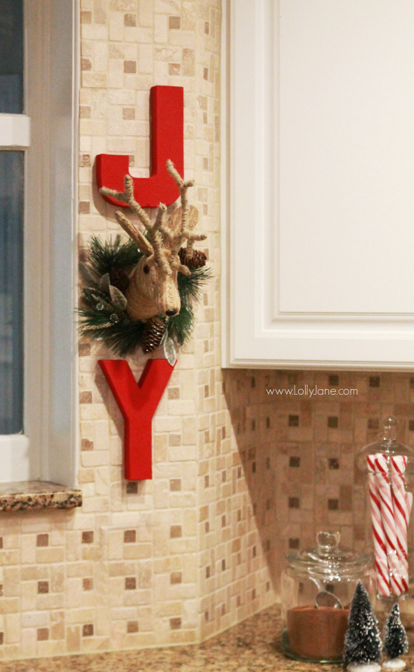 DIY | Adorable JOY Christmas wall decor. Cute way to dress up your kitchen. Click through for cute Christmas kitchen decor ideas.