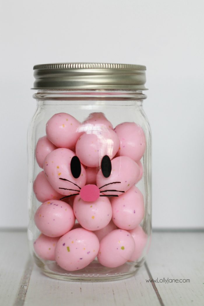 Adorable and EASY mason jar idea! Apply little faces to clear mason jars and fill with colorful candies to make quick Easter mason jar craft favors! Sooo cute!  Love this BUNNY mason jar! 