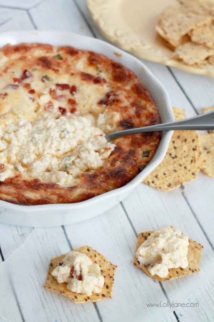 Four cheese hot artichoke dip recipe. The best dip recipe out there! Must try artichoke dip recipe!! Great side dish recipe and a fun Cinco de Mayo party dish! 