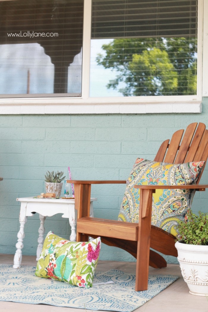 Colorful front porch tips, lots of pretty decor ideas by layering textures and patterns.