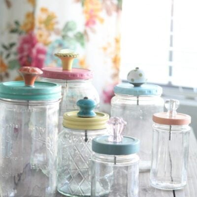 upcycled mason jar with pretty glass knob tops
