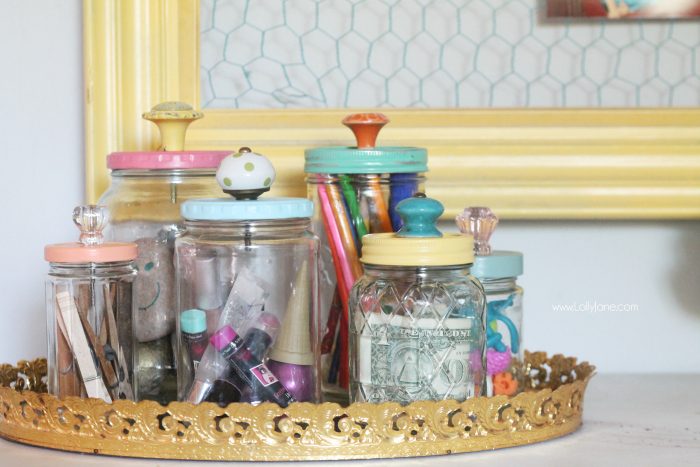 recycled food jars turned storage jars with glass knob tops