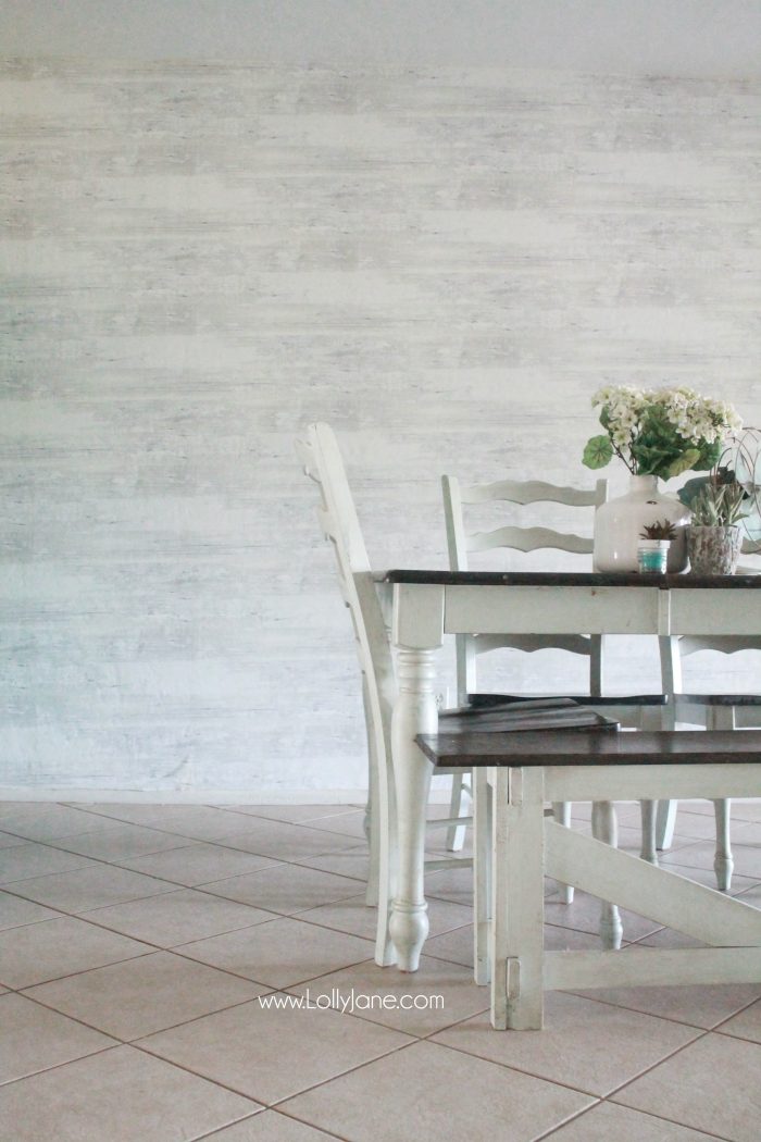 Faux wood wallpaper from Walls Republic, a fast alternative to shiplap or planked walls. Looks so good in this farmhouse dining room! Come see the full before/after room reveal! 