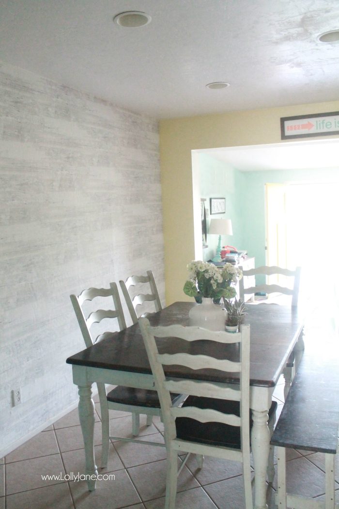 Faux wood wallpaper from Walls Republic, a fast alternative to shiplap or planked walls. Looks so good in this farmhouse dining room! Come see the full before/after room reveal!