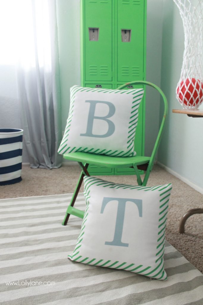 Vintage Industrial Boys Bedroom. Lots of wood tones, grays and neutrals for a vintage industrial boys room. Cute decor ideas and tips to keep it neat. Fun accessories like a basketball hoop and green lockers to complete the space.