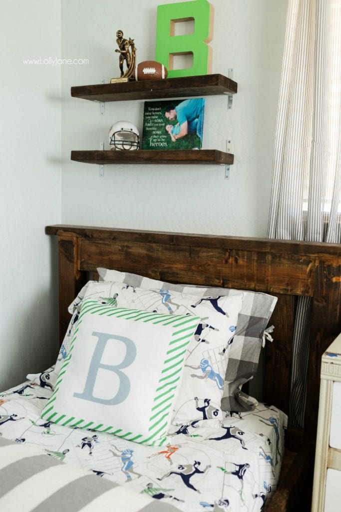 Vintage Industrial Boys Bedroom. Lots of wood tones, grays and neutrals for a vintage industrial boys bedroom. Cute decor ideas and tips to keep it neat. Fun accessories like a basketball hoop and green lockers to complete the space.