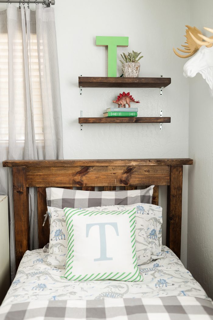 Vintage Industrial Boys Bedroom. Lots of wood tones, grays and neutrals for a vintage industrial boys room. Cute decor ideas and tips to keep it neat. Fun accessories like a basketball hoop and green lockers to complete the space.