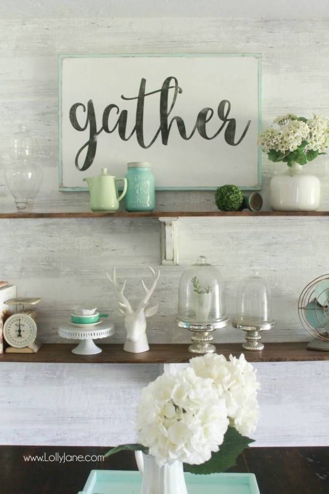 Pretty farmhouse dining room shelves, click through to see how easily the room came together. Step by step how to create this look! Pretty farmhouse dining room decor ideas! DIY farmhouse shelves using stain + paint! | Shop now: https://www.etsy.com/listing/243648125/gather-wooden-sign