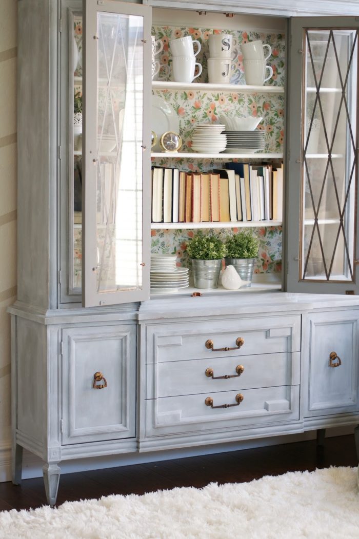 Gorgeous painted hutch makeover. Come see the before and after of this beautiful hutch using BB Frosch chalk paint powder! Rifle Paper Co wallpaper inside this pretty chalk paint hutch!