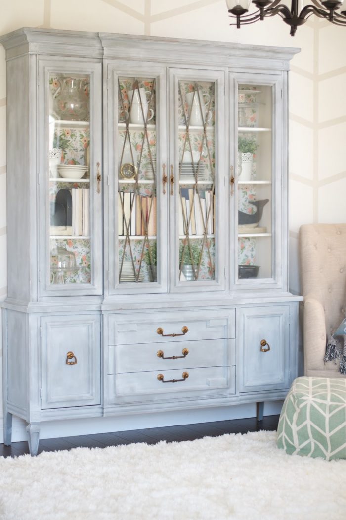 Gorgeous painted hutch makeover. Come see the before and after of this beautiful hutch using BB Frosch chalk paint powder! Rifle Paper Co wallpaper inside this pretty chalk paint hutch!