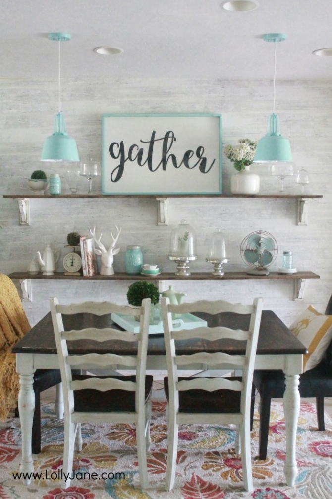 Gorgeous farmhouse dining room. All the tips to achieve this look without breaking the bank! Love the aqua dining room accents and the farmhouse pendants too! Pretty neutral dining room ideas!