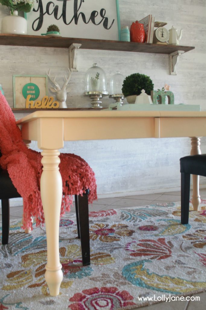 Love this colorful farmhouse dining room! Lots of color with classic pieces. This apricot dining room table is a fun way to bring color to a neutral space! Learn how to get a professional finish on your furniture!