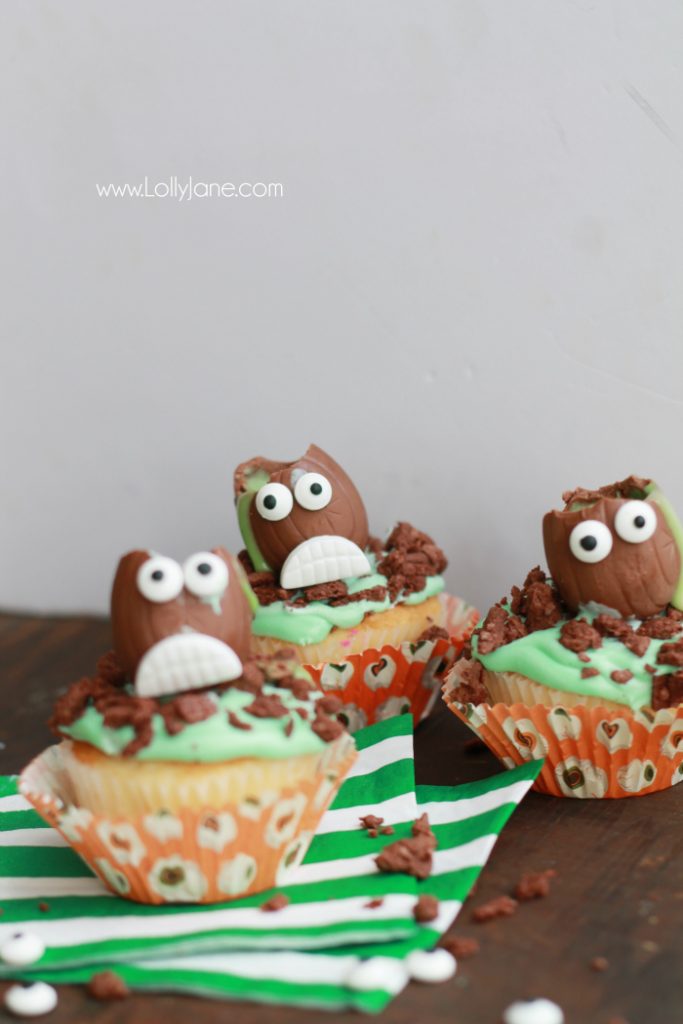 The cutest Halloween Cadbury Screme Eggs Zombie Cupcakes for a cute Halloween treat! Great Halloween party idea, cute kids Halloween treat idea! Love these easy zombie cupcakes! 