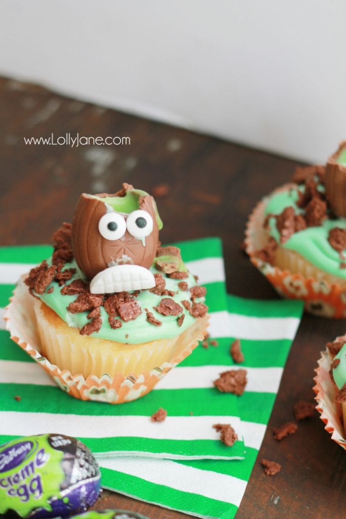 The cutest Halloween Cadbury Screme Eggs Zombie Cupcakes for a cute Halloween treat! Great Halloween party idea, cute kids Halloween treat idea! Love these easy zombie cupcakes! 