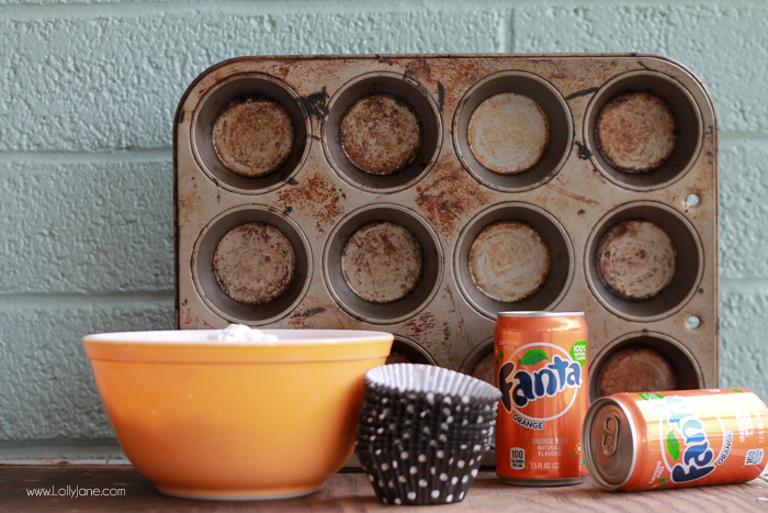 Orange Fanta GHOST Cupcakes, perfect for Halloween! Sprinkled with crushed OREO's to look like dirt. Boo!