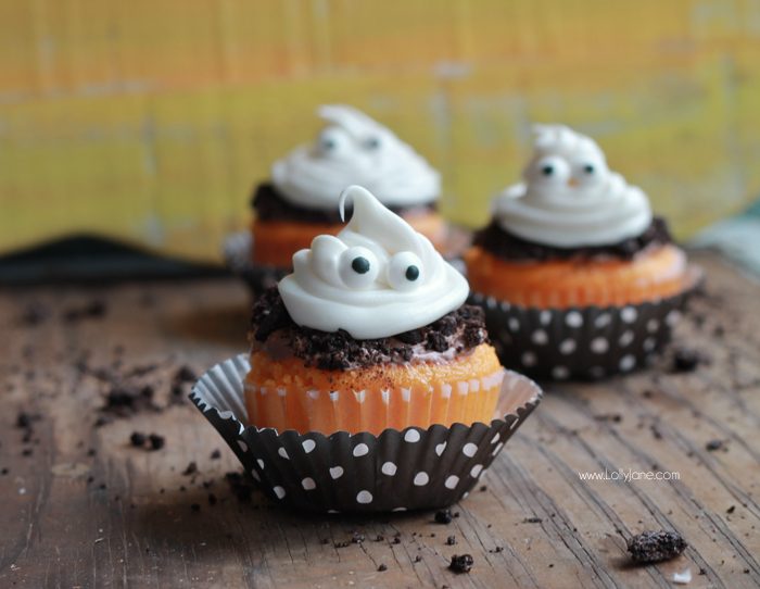 Orange Fanta GHOST Cupcakes, perfect for Halloween! Sprinkled with crushed OREO's to look like dirt. Boo!