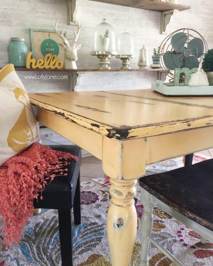 Love this colorful farmhouse dining room! Lots of color with classic pieces. This apricot dining room table is a fun way to bring color to a neutral space! Learn how to get a professional finish on your furniture!