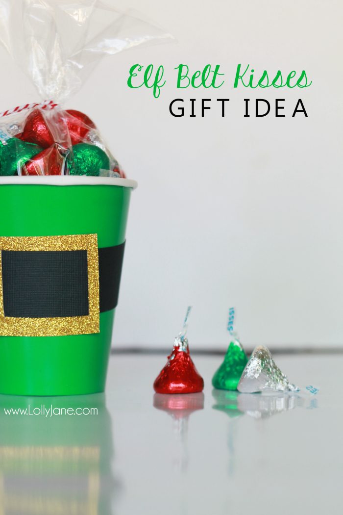 Check out this cute Christmas gift idea, elf kisses treat idea, just fill a green cup with holiday Hershey kisses and tape on an "elf belt" so fun! Cute Christmas neighbor gift idea or cute Christmas craft idea! 