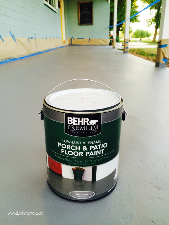 How to paint concrete floors: use a concrete paint porch and floor paint for secure adhesion. Click through for an awesome striped porch makeover.