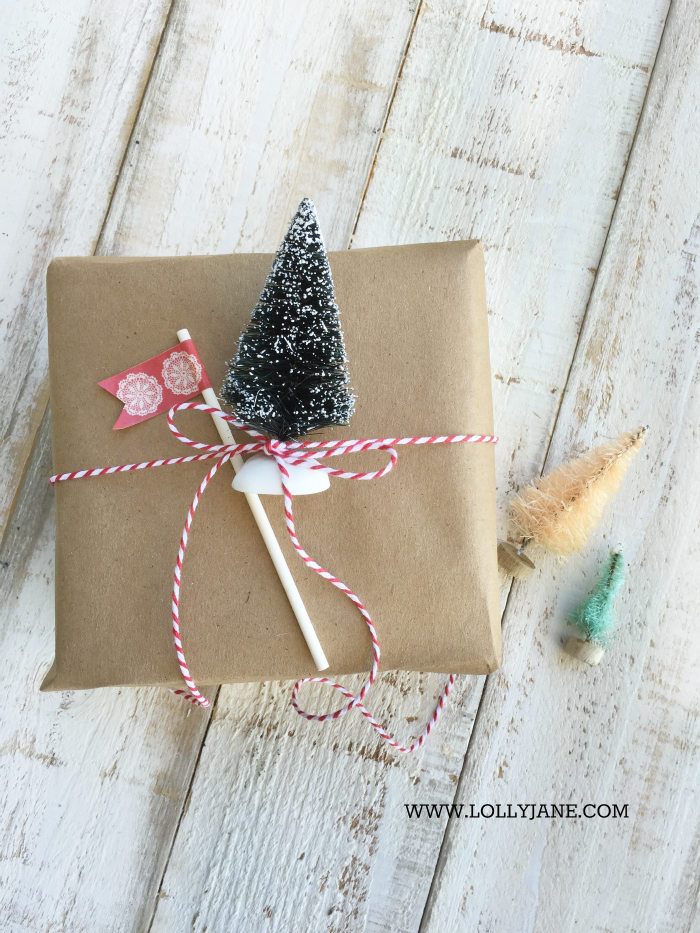 Easy gift wrap idea: tie a bottle brush tree with bakers twine! Love this bottle brush tree gift wrap, so cute and easy! via @lollyjaneblog