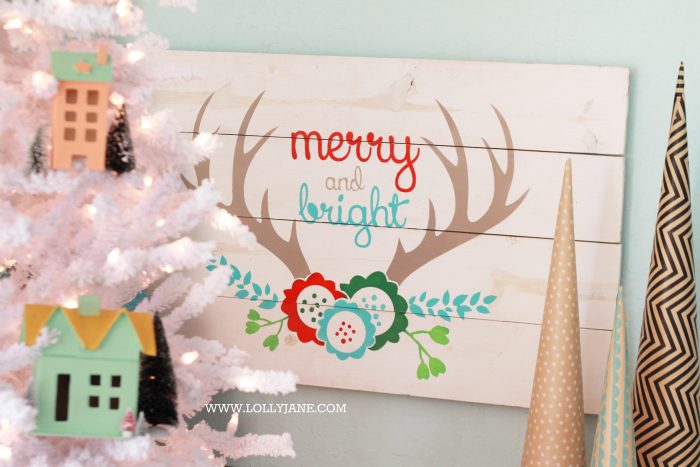 Festive merry and bright pallet sign! Head to LollyJane.com to see how to make this cute Christmas decor!