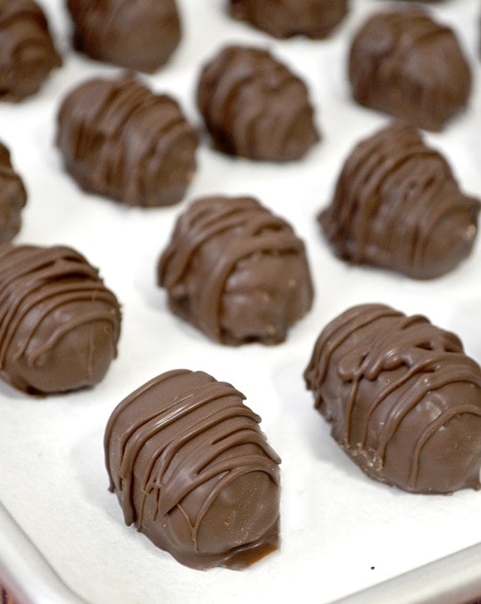 Easy to make Dark Chocolate Mounds Bites. So good! Easy dessert idea, love this easy recipe! Perfect easy Christmas dessert idea, great neighbor gift idea too! 