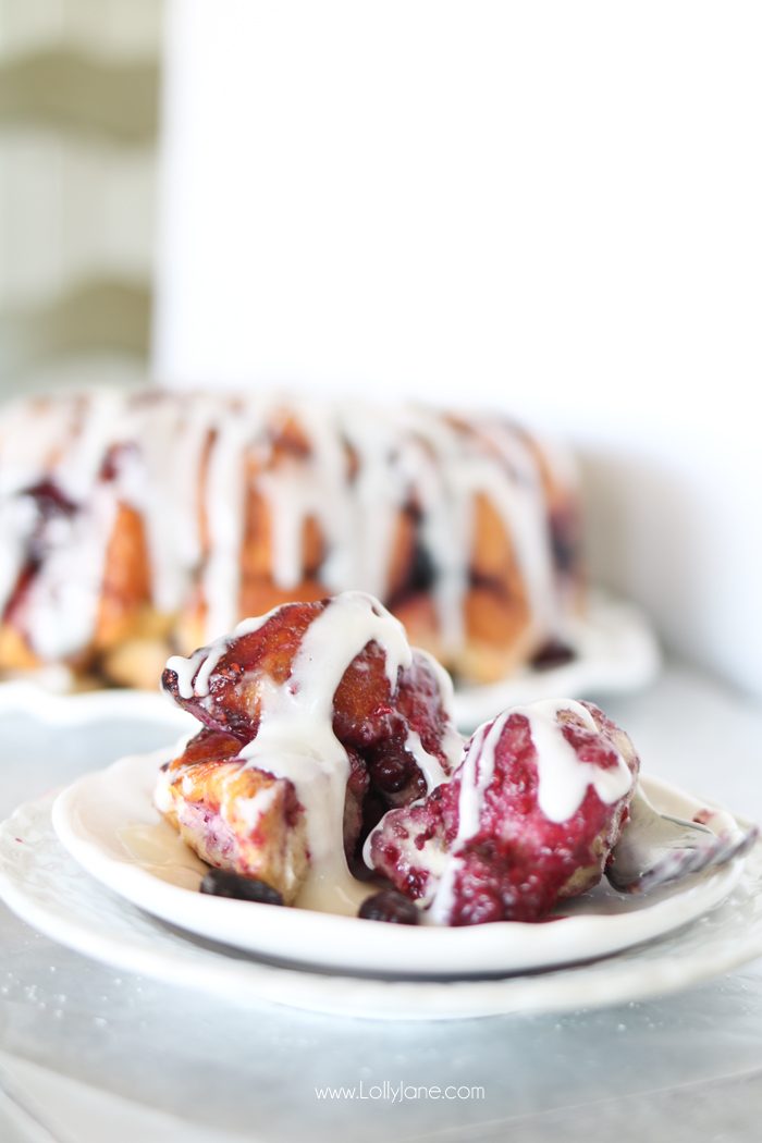 Easy Mixed Berry Monkey Bread filled cream cheese AND a cream cheese glaze. So dang good!