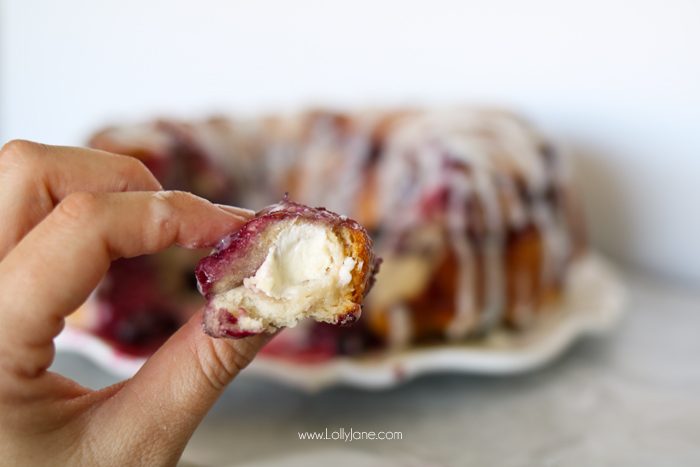 Easy Mixed Berry Monkey Bread filled cream cheese AND a cream cheese glaze. So dang good!