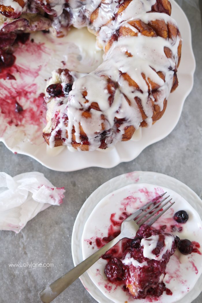 Easy Mixed Berry Monkey Bread filled cream cheese AND a cream cheese glaze. So dang good!